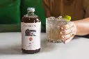 Tonic Lifestyle Image Cocktail Simple Syrup Pink House Alchemy Hand.webp